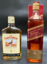 A bottle of Johnny walker Red label old scotch whisky & the famous grouse finest scotch whisky 350ml