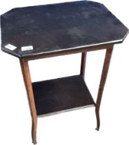 Antique table, the octagonal surface above a lower rectangular shelf, raised on shaped legs