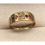 Chester 9ct yellow gold ladies ring set with four pink stones and three seed pearls- missing one. [