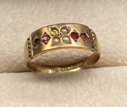 Chester 9ct yellow gold ladies ring set with four pink stones and three seed pearls- missing one. [