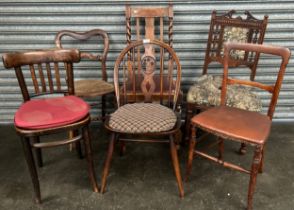 A selection of six antique chairs to include Ercol chair and oak barley twist chair
