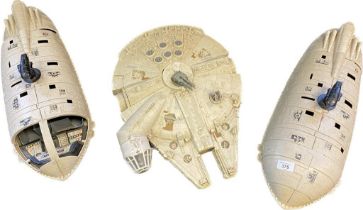 Original Star Wars Millennium falcon and two transporter models.