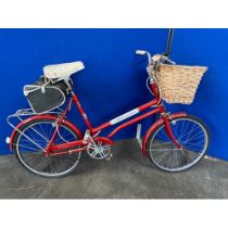 A vintage elswick hopper cosmopolitan 1970s bicycle with fitted saddle and bag