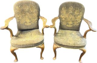 A pair of 19th Century armchairs with floral pattern on Queen Anne legs