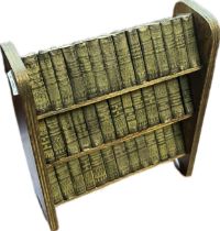 Antique miniature three section bookcase containing a collection of William Shakespeare books.