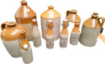 A collection of stone ware flagons & ginger beer bottles to include Hendrys of Edinburgh ginger beer