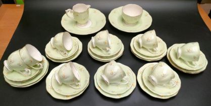 A bell 37 piece flower pattern tea service with milk & cream jug