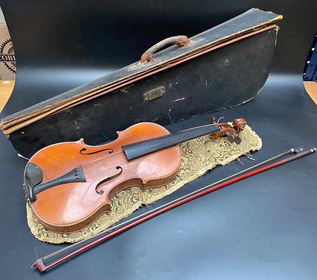 An antique Francois Barzoni violin dated 1891 with original label and back press initial FB with bow