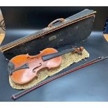 An antique Francois Barzoni violin dated 1891 with original label and back press initial FB with bow