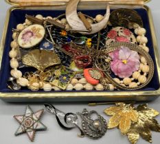 A Collection of costume jewellery; necklaces, pendants, brooches, Millefiori worked star brooch