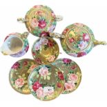 Antique hand painted tea set in a floral design