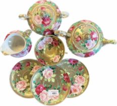 Antique hand painted tea set in a floral design