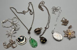 A Selection of silver jewellery; Chinese export jade carved pendant, Silver and enamel banana