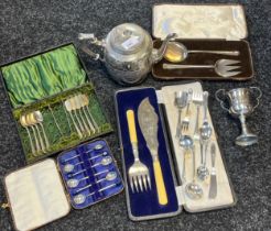 A Selection of silver plated items; boxed cutlery sets, ornate tea pot, loose flatwares and trophy