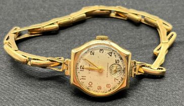 Vintage ladies 9ct yellow gold Cyma Cocktail watch, Gold case and gold elasticated bracelet. [In a