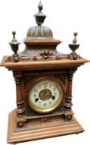 A 19th century 'The Greenwich clock' by W.E Watts of Nottingham with key & pendulum & original label
