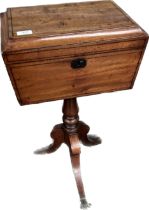 Regency mahogany teapoy, of sarcophagus form, raised on a turned column and tripod base