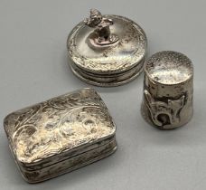 Three silver items; 925 silver gnome figural topped pill box, London silver rectangular shaped