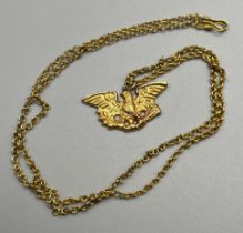 14ct yellow gold bird holding wreath pendant with a 14ct yellow gold necklace. [17.07 grams] [