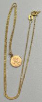 9ct yellow gold St Christopher pendant with a 9ct yellow gold necklace. [Necklace- 22cm drop] [