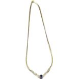 14ct yellow gold ladies necklace fitted with a centre Purple/ blue oval cut stone flanked by eight