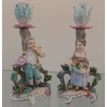 A pair of 19th century Meissen figure candle stick holders. [15cm high]