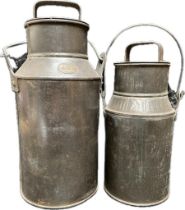 A Collection of two antique J.C.B milk cannisters [32cm tallest]