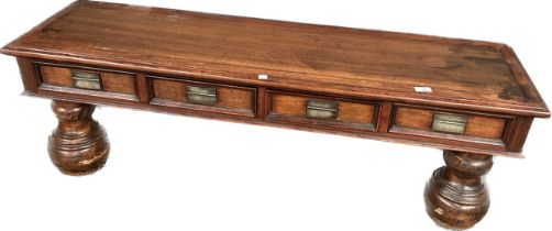 Takhat table, the rectangular top above four short drawers, raised on baluster legs [4.x53.5x38cm]