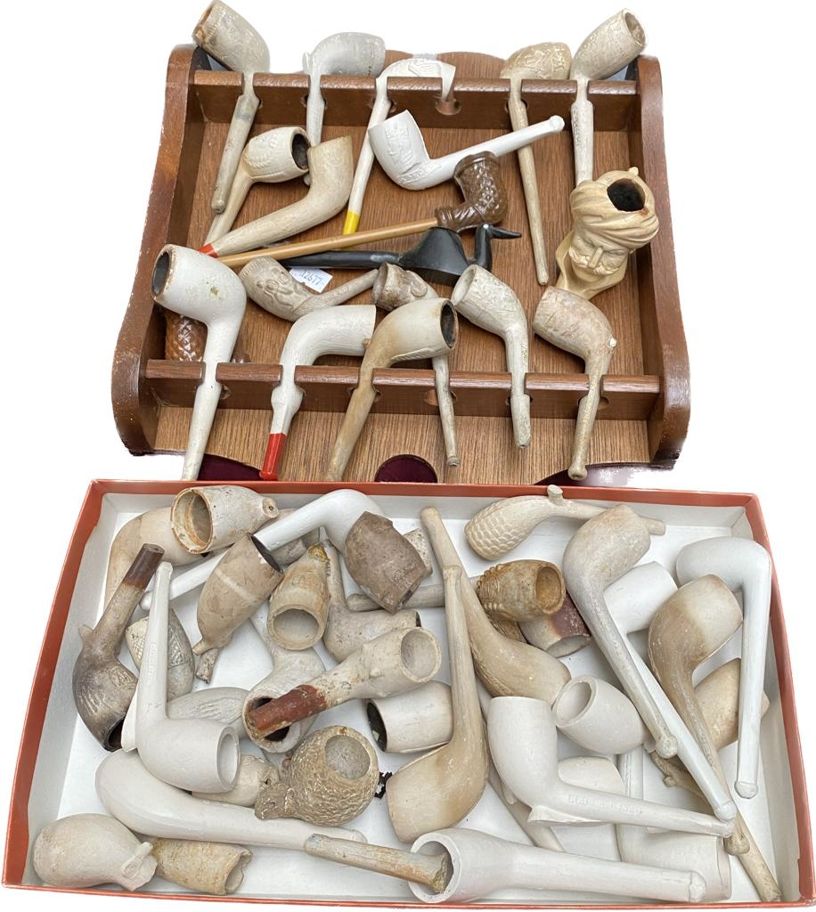 A Large collection of antique clay pipes includes meerschaum gentleman pipe and many more
