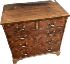 19th century walnut chest of drawers, two short drawers over three graduating long drawers, raised