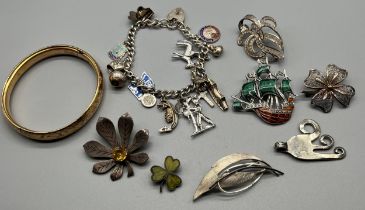 A Selection of silver and plated jewellery; gilt metal bangle, Edinburgh Silver 'Iona' leaf brooch