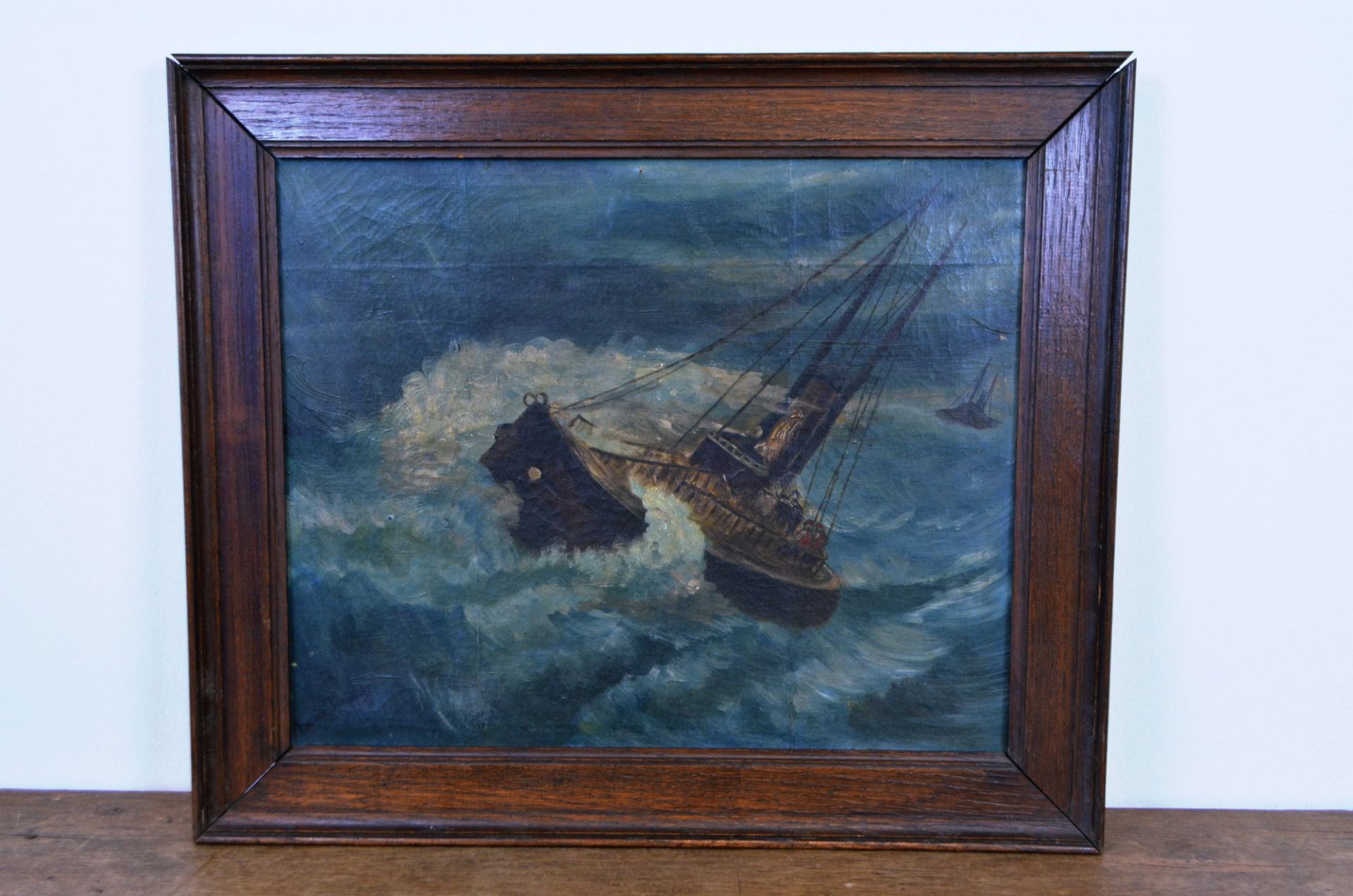 Peinture sur toile "Bateau en tempête" signé