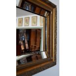 Miroir biseauté ancien avec encadrement en bois doré