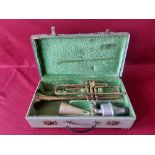 Vintage Corton trumpet with accessories.