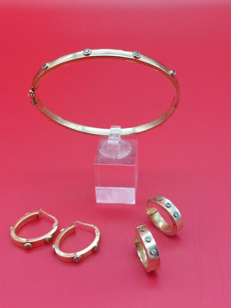 9ct gold Bracelet and 2 sets of earrings with diamonds. Weight 12.5 grams