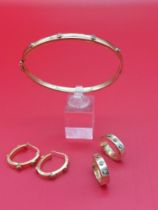 9ct gold Bracelet and 2 sets of earrings with diamonds. Weight 12.5 grams