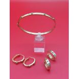 9ct gold Bracelet and 2 sets of earrings with diamonds. Weight 12.5 grams