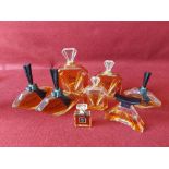 Collection of vintage glass perfume bottles with original contents.