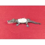 Bronze signed alligator pin cushion