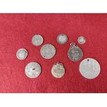 Collection of silver coins.