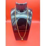 9ct gold necklace with 9ct gold & Amber pendant weight 11.1 grams