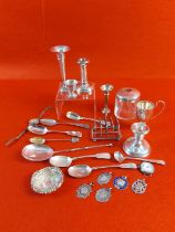 Collection of mixed hallmarked silver. Candle sticks and flutes are filled. Total weight without