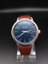 Hugo Boss Orange mens stainless steel watch with leather strap.