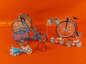 Collection of 4 metal pedal bikes & 4 plastic miniature American style bikes approx 3.5"" in