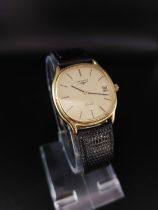 Mens 9ct gold Longines watch, tear to strap