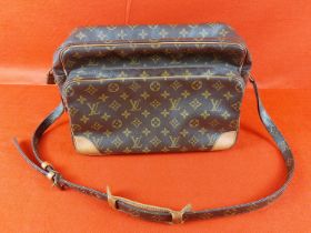 Authentic Louis Vuitton Monogram Nile shoulder bag. Serial number TH 8905. Size approximately
