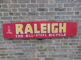 A vintage Raleigh ""THE ALL-STEEL BICYCLE"" Hardboard advertising sign 5ft in length.