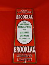 Brooklax Chemists enamel advertising sign. Mounted onto a wooden back 22.5 " hieght, 7.5" width.