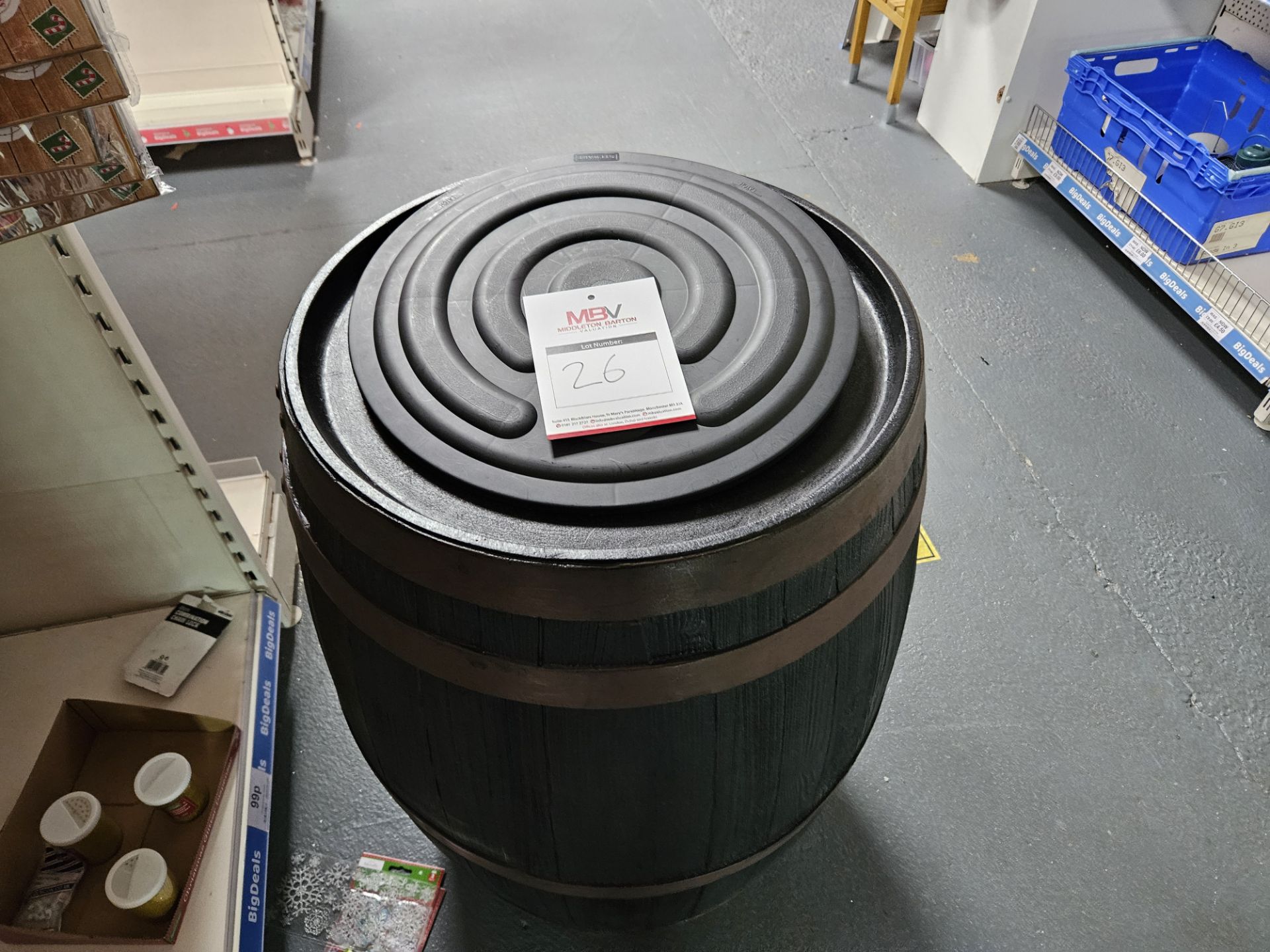 Wooden barrel effect water butt.