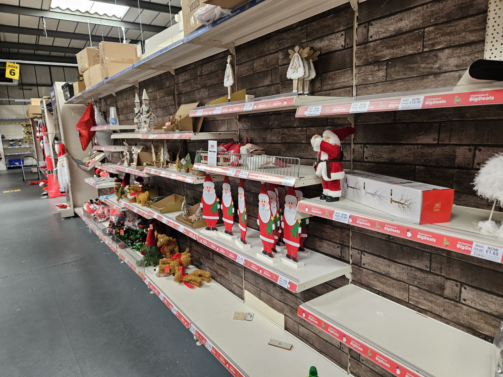 Aisle of assorted Christmas ornaments. Shelving not included.